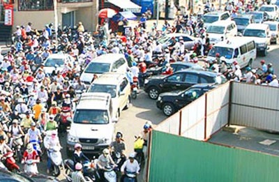 Sẽ thí điểm thu phí tự động ô tô vào trung tâm TPHCM - 1 Sẽ thí điểm thu phí tự động ô tô vào trung tâm TPHCM - 1