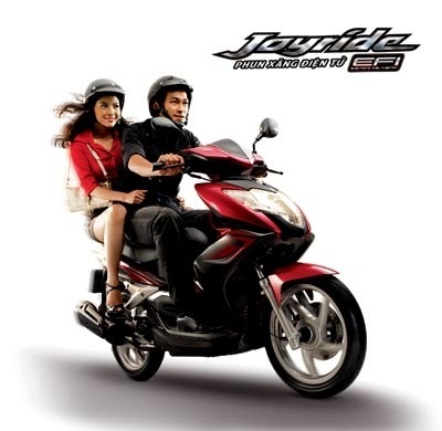 SYM Auto: “Mua xe tải trúng thưởng xe máy” - 1