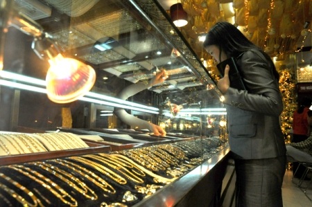 Mãi lực cả vàng và USD đều trầm lắng - 1