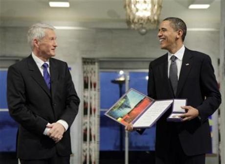 Obama chia tiền Nobel cho 10 tổ chức cứu tế - 1