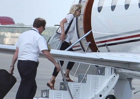 Tiger Woods lại bị vợ dọa ly hôn - 1