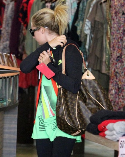 Louis Vuitton: Ashley Tisdale with Louis Vuitton Multicolor keepall 45