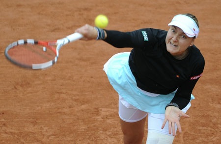 Dementieva may mắn đi tiếp, Schiavone tiễn Wozniacki - 2