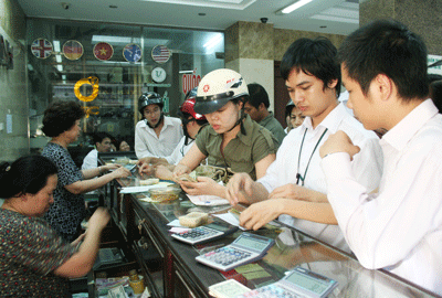 Giá vàng và USD cùng hạ nhiệt - 1