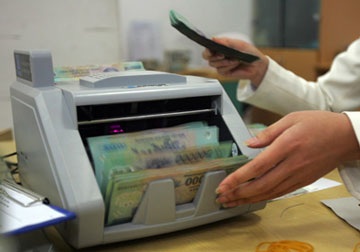 Tiếp tục điều tiết lãi suất theo hướng giảm dần - 1 Tiếp tục điều tiết lãi suất theo hướng giảm dần - 1