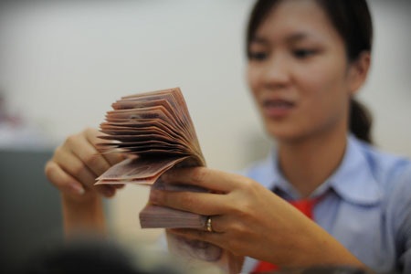 Giao dịch VND chủ yếu ở kỳ hạn ngắn - 1