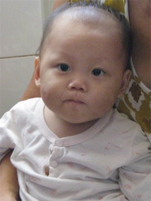 Khởi tố người mẹ hành hạ con 9 tháng tuổi - 1