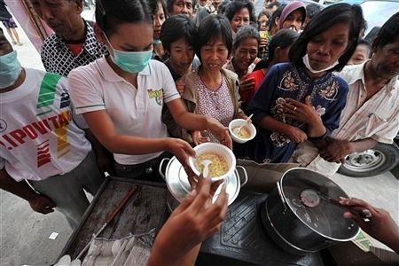 Cận cảnh sóng thần, núi lửa tàn phá Indonesia - 16