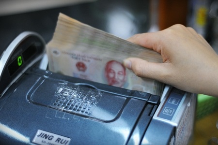 Lãi suất huy động VND lên tới 14,5% - 1