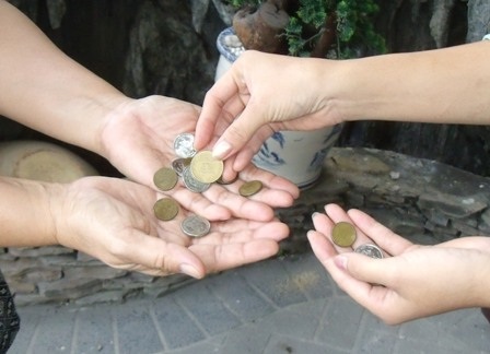 TPHCM: Tiền xu vẫn được lưu hành rộng rãi - 2