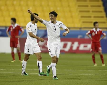 Chủ nhà Qatar vào Tứ kết, Trung Quốc về nước - 3