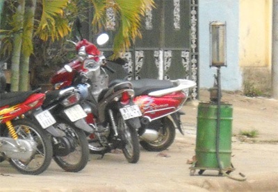 Phá vụ gian lận tinh vi tại các cột xăng mi ni - 1 Phá vụ gian lận tinh vi tại các cột xăng mi ni - 1