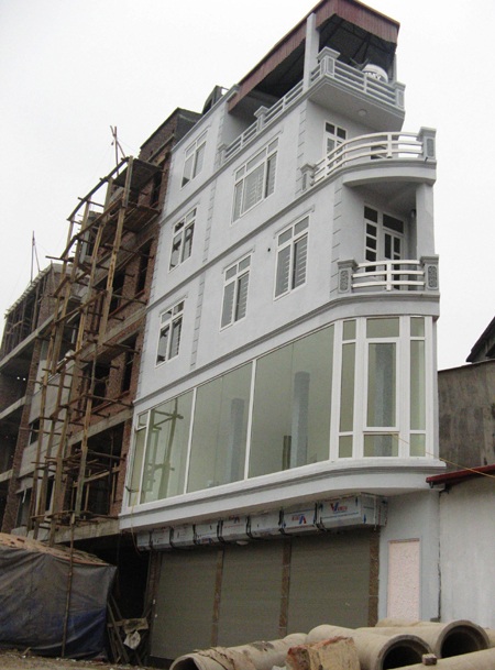 Cận cảnh những ngôi nhà "kì dị" trên các đường phố mới - 6