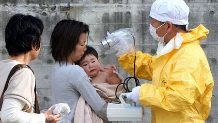 Những gương mặt trẻ thơ trong thảm họa ở Nhật - 22