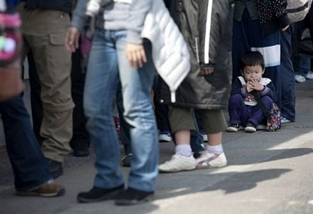 Những gương mặt trẻ thơ trong thảm họa ở Nhật - 14