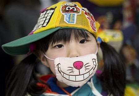 Những gương mặt trẻ thơ trong thảm họa ở Nhật - 16