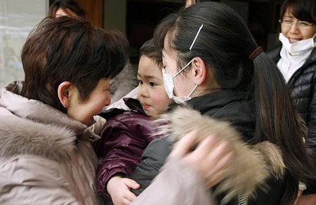 Những gương mặt trẻ thơ trong thảm họa ở Nhật - 5