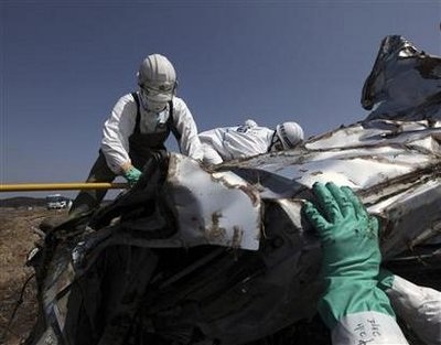 Nhật Bản lại rung chuyển đúng 1 tháng sau thảm họa kép - 1