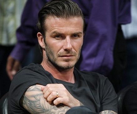 Beckham khoe kiểu tóc mới - 1