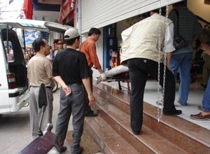 Bảo vệ đại lý Bitis ở Chùa Bộc bị giết hại - 1 Bảo vệ đại lý Bitis ở Chùa Bộc bị giết hại - 1