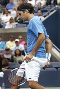 Federer, Henin vững bước vào vòng 3 - 1