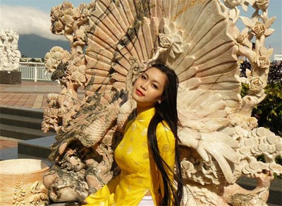 Chùm ảnh Hoa hậu Thuỳ Dung rực rỡ trong nắng xuân - 12