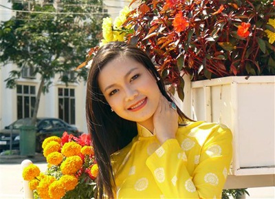 Chùm ảnh Hoa hậu Thuỳ Dung rực rỡ trong nắng xuân - 2