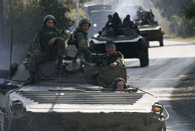 Chùm ảnh: Lính Nga rầm rộ rút khỏi vùng đệm Gruzia - 11