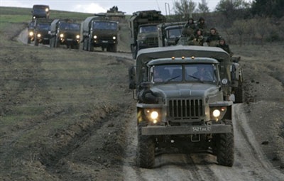 Chùm ảnh: Lính Nga rầm rộ rút khỏi vùng đệm Gruzia - 13