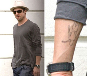 Brad Pitt xăm hình vì Angelina Jolie? - 1 Brad Pitt xăm hình vì Angelina Jolie? - 1
