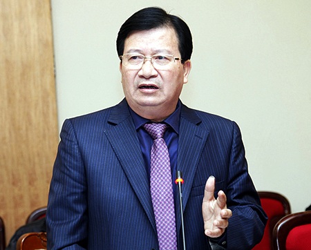 Bộ trưởng Xây dựng Trịnh Đình Dũng trình bày nội dung dự luật Kinh doanh BĐS sửa đổi.