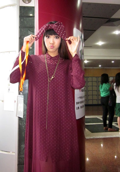 Lan Khuê tạo dáng nhí nhảnh tại cuộc thi Siêu mẫu châu Á