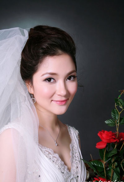 Những Hoa hậu Việt từng ly dị chồng - 2 Hoa hậu Việt Nam 2004 Nguyễn Thị Huyền