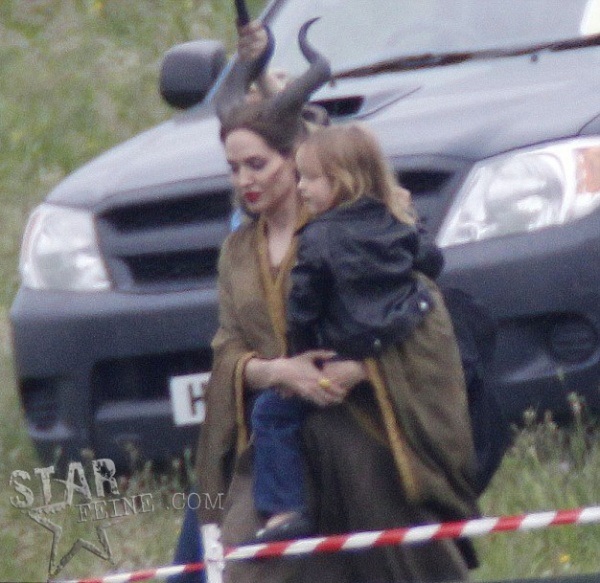 Angelina Jolie and daughter Vivienne on set