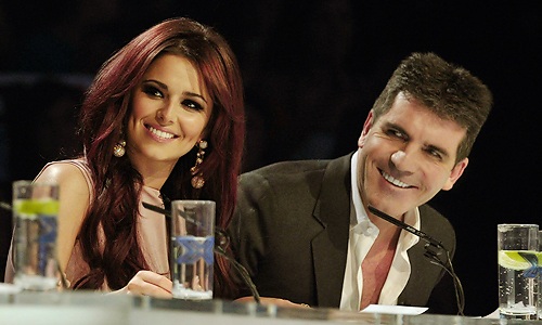 The X-Factor Mỹ “đóng cửa”, Simon Cowell trở lại ghế nóng phiên bản Anh - 3 Simon Cowell và Cheryl Cole luôn là một cặp đôi thu hút trên ghế nóng The X-Factor Anh