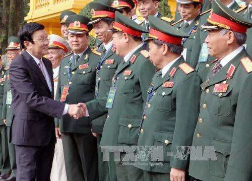 Chủ tịch nước Trương Tấn Sang tiếp Đoàn cán bộ cao cấp cựu chiến binh Quân đoàn 2. Ảnh: TTXVN.
