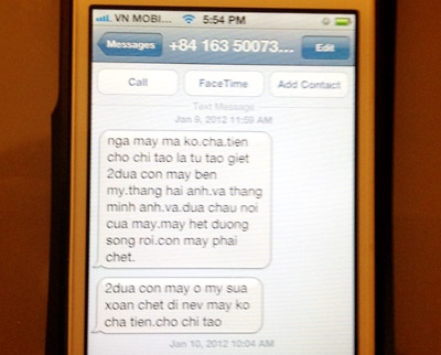 Nội dung tin nhắn đe dọa lưu trong điện thoại của bà Nga.