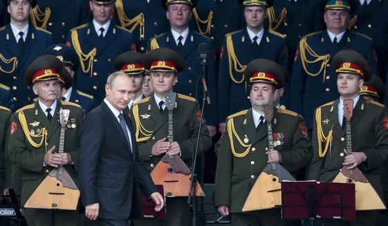 Đáp trả Mỹ, Nga mạnh tay chi 400 tỷ USD hiện đại hóa quân đội - 1 Tổng thống Nga Vladimir Putin (Ảnh: