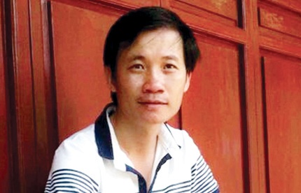 Nhà phê bình Nguyễn Quang Long. Ảnh: Mai Tuyết Hoa