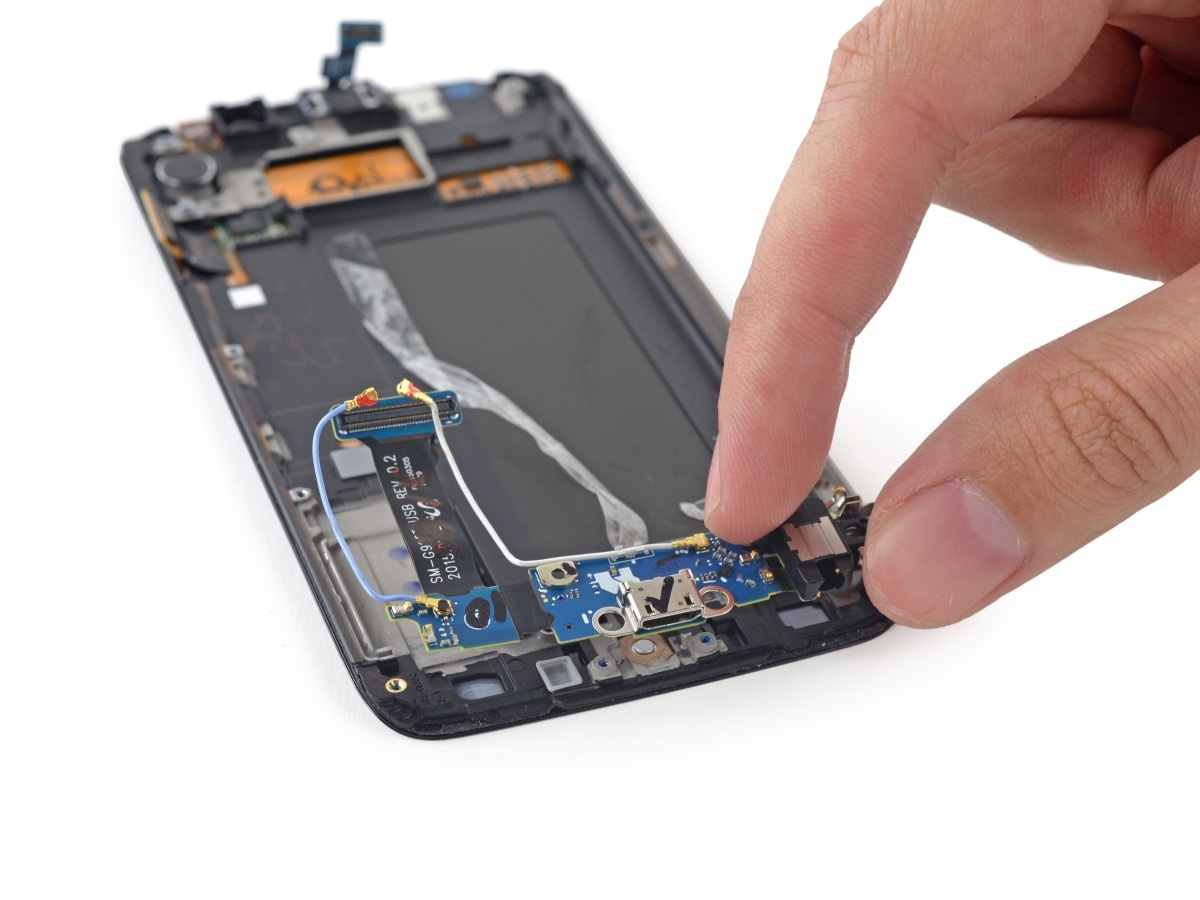 Tiếp tục tháo rời bo mạch phụ