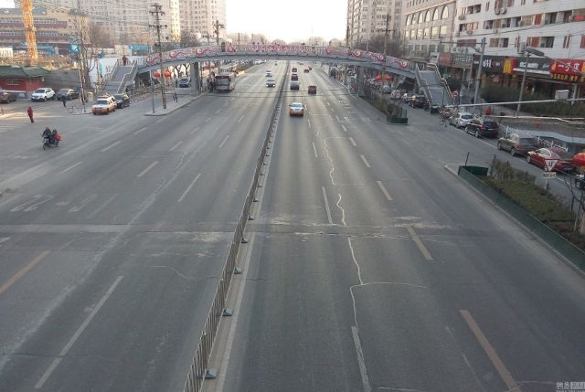 Bắc Kinh vắng vẻ lạ thường khi người dân về quê ăn Tết - 3 Bắc Kinh trong những ngày này không còn hình ảnh đường phố chật kín với những hàng xe nối đuôi nhau