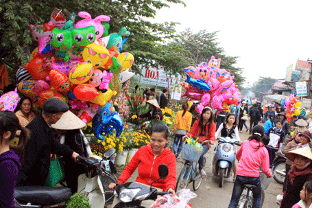 Hương vị Tết và sắc màu Xuân qua phiên chợ cuối  năm - 1