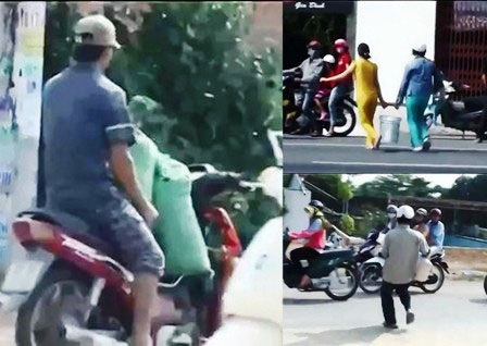 Mang tiếng hôi của "vẻ vang" nỗi gì!!!??? - 2 Một số người dân thấy vậy đã mang dụng cụ ra hốt bắp đem đi (ảnh: Thảo Trần)