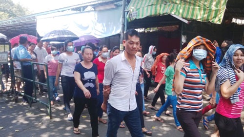 Công nhân hay siêu nhân? - 1 Bị ép tăng ca từ 90-130 giờ/tháng, công nhân Công ty TNHH May Top One ngừng việc để phản đối