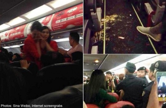 Nữ hành khách Trung Quốc bị nhân viên an ninh áp giải khỏi máy bay. Ảnh: Sina Weibo