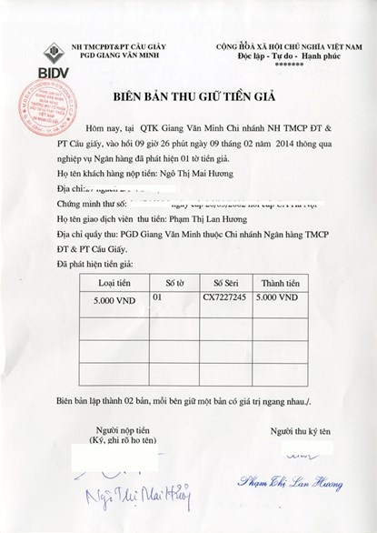 Tiền giả mệnh giá 5.000 đồng len lỏi vào chợ - 2 Biên bản xác nhận và thu giữ của ngân hàng BIDV đối với tờ tiền giả mệnh giá 5.000 đồng.