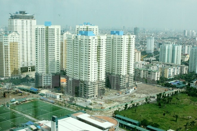 Giá chung cư sẽ tăng do phải gánh phí bảo lãnh của ngân hàng - 1 (Ảnh: Hoàng Lâm/TTXVN)