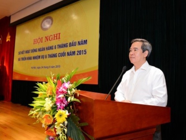 Thống đốc Bình: Tái cơ cấu, ngân hàng không lo bị thiệt về tiền bạc - 1 Thống đốc Nguyễn Văn Bình phát biểu tại Hội nghị. (Nguồn: Ngân hàng Nhà nước)