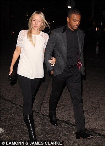 Hậu vệ Patrice Evra và vợ Sandra