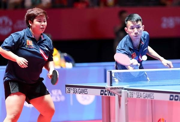 Bóng bàn Việt Nam giành thêm hai HCĐ - 1 Bóng bàn Việt Nam đang thi đấu tròn vai ở SEA Games 28
